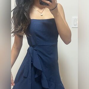 Cute navy wrap dress with ruffles and zipper back